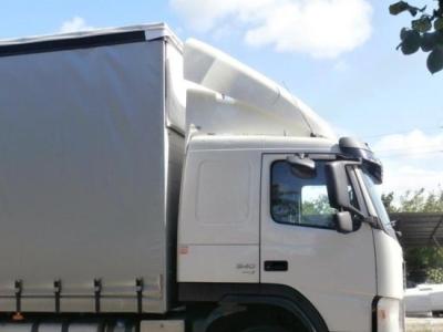 В чём преимущество спойлера на крыше грузового автомобиля?