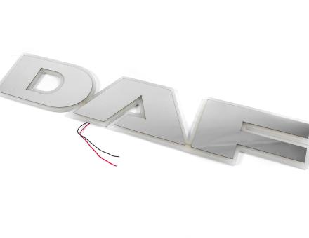 Надпись на решетку DAF нержавейка с оранжевой подсветкой (68см.*13,5см.)