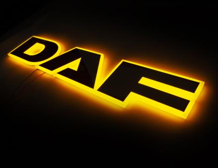 Надпись на решетку DAF нержавейка с оранжевой подсветкой (68см.*13,5см.)