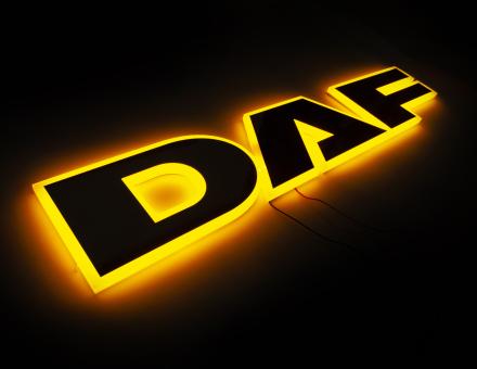 Надпись на решетку DAF нержавейка с оранжевой подсветкой (68см.*13,5см.)
