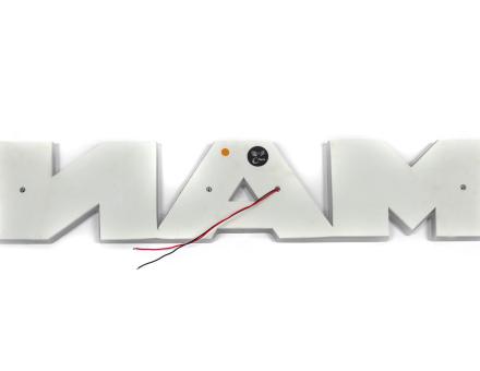 Надпись на решетку Man нержавейка с оранжевой подсветкой (63см.*13,5см.)