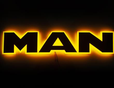 Надпись на решетку Man нержавейка с оранжевой подсветкой (63см.*13,5см.)