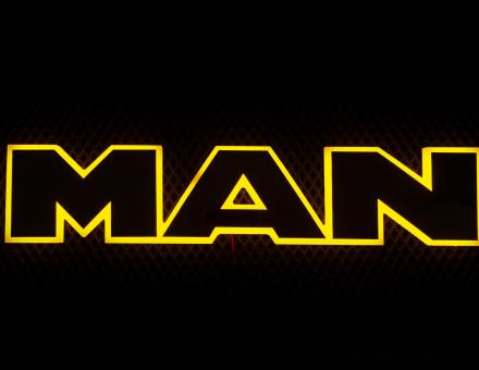 Надпись на решетку Man нержавейка с оранжевой подсветкой (63см.*13,5см.)