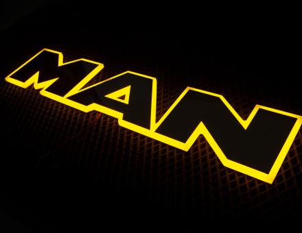 Надпись на решетку Man нержавейка с оранжевой подсветкой (63см.*13,5см.)